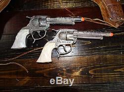 17700 Vintage Pair Gene Autry Toy Cap Gun with Leather Double Western Holster