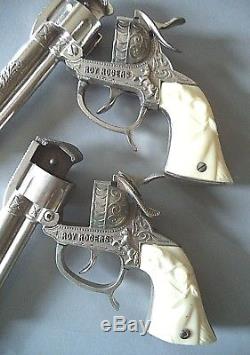 2 Roy Rogers 9 Leslie Henry cap guns white horse grips 1 is a smoker Excellent