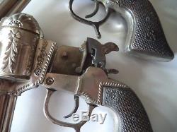 2 Roy Rogers and Trigger RR cap guns by George Schmidt Los Angeles California