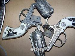 2 VINTAGE HUBLEY TEXAN JR CAP GUN PISTOL with leather holster and belt