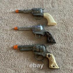 3 Vintage Western Toy Cap Guns Roy Rogers, Pony Boy & Texan Jr