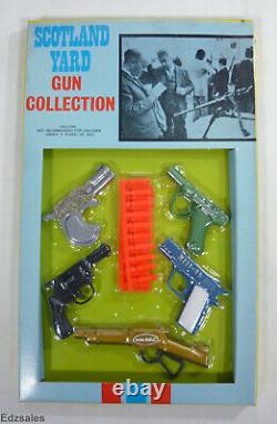 4 Vintage Larami Scotland Yard Gun Collection Miniature Toy Firing Orange Pellet