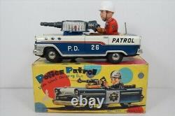 Antique Japanese tin toys Nomura Toy Police Patrol with Lited Shooting Gun