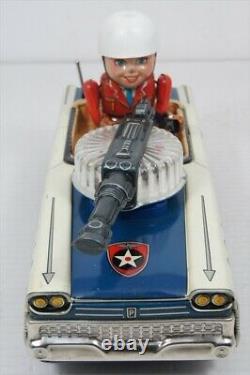 Antique Japanese tin toys Nomura Toy Police Patrol with Lited Shooting Gun