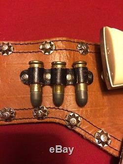 Beautiful vintage studded Roy Rogers double holster Hubley cap guns