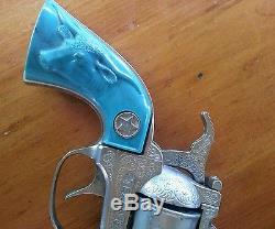 COLT 38 COWBOY CAP GUN SET TURQUOISE on HOLSTERS and pistol handles