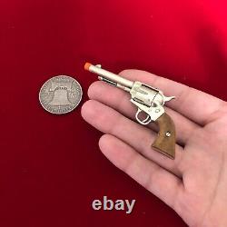 Cap gun Colt Revolver Mini gun Colt Peacemaker Cowboy gun Colt single action