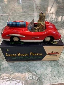 Cragstan SPACE ROBOT PATROL Friction Car with Sparkling Atomic Gun #565 with Box