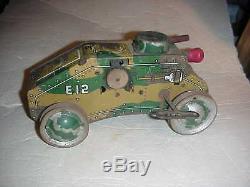 EARLY TIN WINDUP MILITARY TANK With SHOOTING GUN