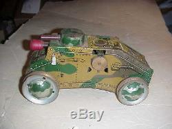 EARLY TIN WINDUP MILITARY TANK With SHOOTING GUN