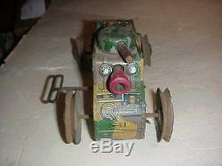 EARLY TIN WINDUP MILITARY TANK With SHOOTING GUN