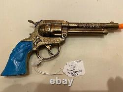 Gold Texas Cap Gun with Turquoise Grips Mint by Leslie-Henry