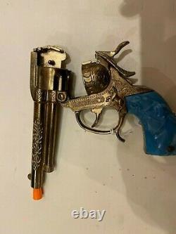 Gold Texas Cap Gun with Turquoise Grips Mint by Leslie-Henry