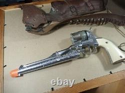 Hubley Colt 45 Brass Cylinder Cap Gun & 18 Blank Holster with 8 Blanks currently