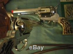 Mattel shootin' shell. 2 gun holster set