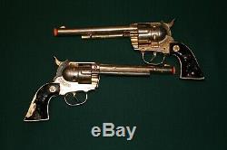 Pair 1950s GOLD Hubley Cowboy Cap Guns