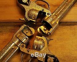 Pair of Gold Hubley Texan Jr Cap Guns with Fancy Holster Belt