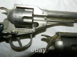 Pair of vintage Hubley Remington. 36 Cap Guns with Leather The Texan Holsters