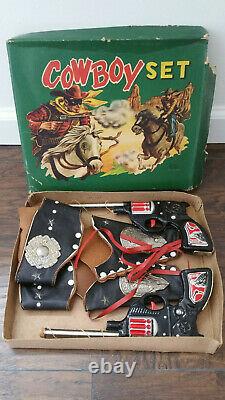 Rare Tin Japan Cowboy Eagle pop cork gun set with leather holster in Box! Not cap