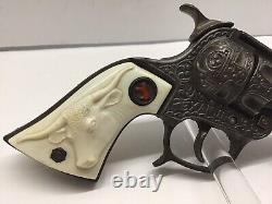 Scarce 1940 Cast Iron Hubley Texan Jr. Dark Finish, Engraved, Colt Logo Cap Gun