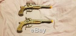 Two Vintage Hubley Dual Flintlock Cast Iron Pirate Toy Cap Guns 40's