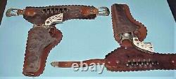 VINTAGE 1950's HUBLEY COLT 38 TOY CAP GUNS AND LEATHER HOLSTER SET WITH BULLETS