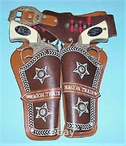 VINTAGE 1950's TWIN WAGON TRAIN GUNS With WHITE GRIPS, & GENUINE LEATHER HOLSTERS