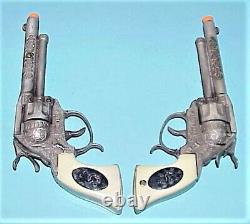 VINTAGE 1950's TWIN WAGON TRAIN GUNS With WHITE GRIPS, & GENUINE LEATHER HOLSTERS