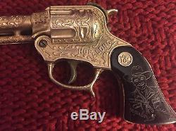 VINTAGE 1950s HOPALONG CASSIDY GOLD PLATED REPEATING TOY CAP GUN WITH BOX