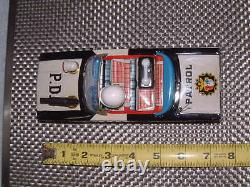 VINTAGE ICHIKO TIN FRICTION DRIVEN POLICE CAR WithROTATING GUN & SIREN. WITH BOX