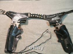 Very Rare Overland Trail Holster set with Flip Cap Guns by Hubley