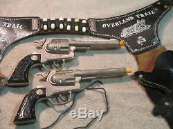Very Rare Overland Trail Holster set with Flip Cap Guns by Hubley