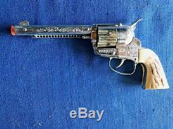 Vintage 1950's Mattel Fanner 50 cap gun pistol withoriginal holster & 6 bullets