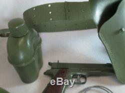 Vintage 1960's Marx Army play set. 45 cap gun, helmet, belt, mess kit, dog tags