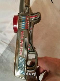Vintage 1960s Nomura TN Japan Tin Friction toy machine gun (RARE)