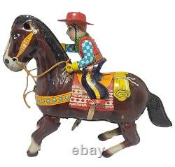 Vintage HAJI Cow Boy/ Gun Wind Up Litho Tin Toy Jumping Horse Made In Japan