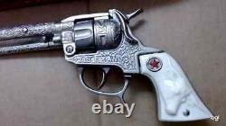 Vintage Hubley. The Texan 50-Shot Repeating Pistol Toy Cap Gun with box