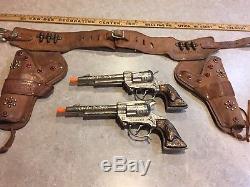 Vintage Leslie Henry Diecast Matt Dillon Gunsmoke Toy Cap Guns & Leather Holster