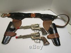 Vintage Leslie Henry Maverick Dual Cap Guns With Metal Grips & Maverick Holster