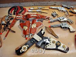 Vintage Lot of Cowboy Cap Gun sets, Vests, Holsters, Rifles from the 1950s