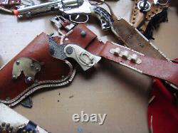 Vintage Lot of Cowboy Cap Gun sets, Vests, Holsters, Rifles from the 1950s