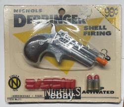Vintage NICHOLS 3-PIECE BULLET, DERRINGER CAP GUN ON CARD VERY NICE