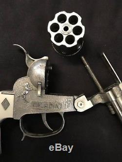 Vintage PALADIN cap gun with holster and 12-bullets, by Halco