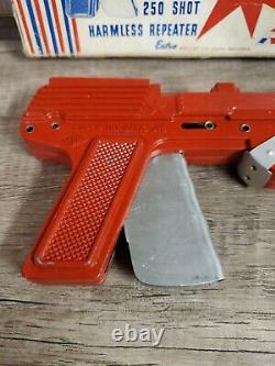Vintage Super Nu Matic JR. Paper Buster gun Red in original package Repeater toy