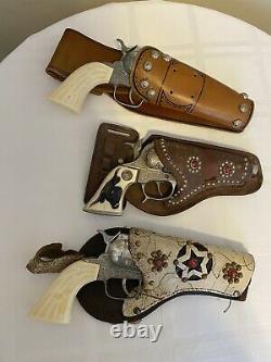 Vintage TOY cap gun holster sets 3 toy guns, spurs, belt, holsters 1950s