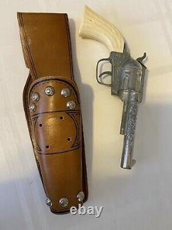 Vintage TOY cap gun holster sets 3 toy guns, spurs, belt, holsters 1950s