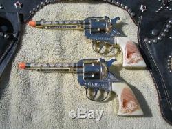 Vintage gold Kilgore mustang cap guns & holster
