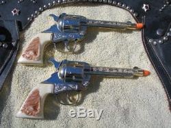 Vintage gold Kilgore mustang cap guns & holster