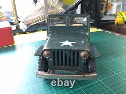Vintage tinplate friction large army jeep with a gun on the back made in japan